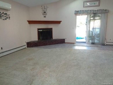 Well-maintained 3-bedroom, 2-bath expanded ranch featuring - photo 4