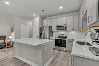 Live the Lowcountry lifestyle in this like-new 2024 townhome in - photo 11