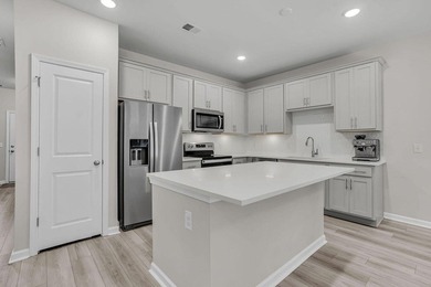 Live the Lowcountry lifestyle in this like-new 2024 townhome in - photo 12