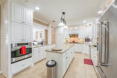 Impeccable custom home offering over 3,580 sq. ft. of timeless