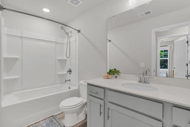 Live the Lowcountry lifestyle in this like-new 2024 townhome in - photo 23