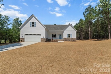New Construction ranch home on large lot with bonus room above - photo 1