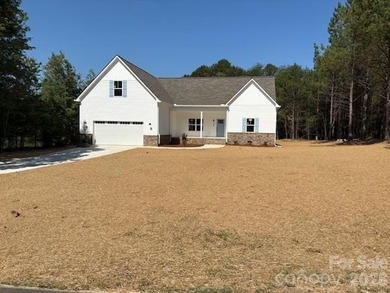New Construction ranch home on large lot with bonus room above - photo 5