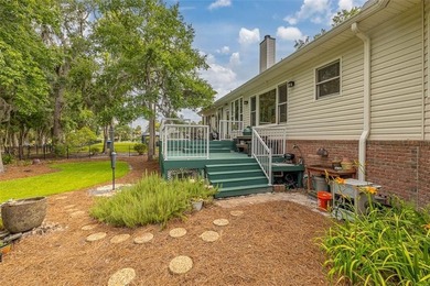 Tucked within the gated community of Oak Grove Island, 189 - photo 31