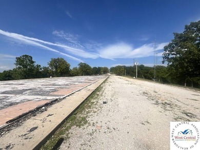 12 acres located perfectly between both Lake of the Ozarks and - photo 3