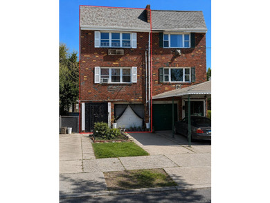 Spacious brick multifamily home offering three levels of living - photo 1
