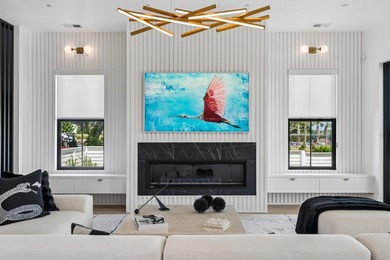 Modern coastal luxury awaits at 4017 Kaolin Street, a - photo 11