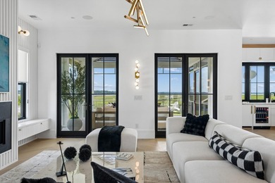 Modern coastal luxury awaits at 4017 Kaolin Street, a - photo 12