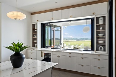 Modern coastal luxury awaits at 4017 Kaolin Street, a - photo 19