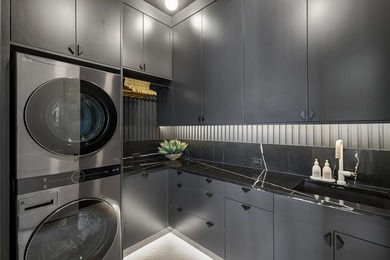 Modern coastal luxury awaits at 4017 Kaolin Street, a - photo 22