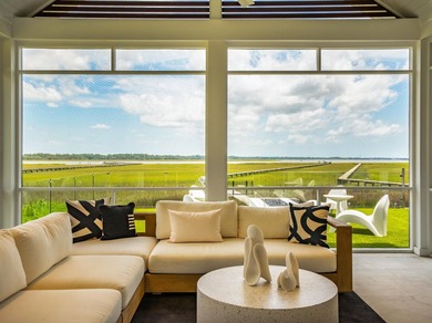 Modern coastal luxury awaits at 4017 Kaolin Street, a - photo 24