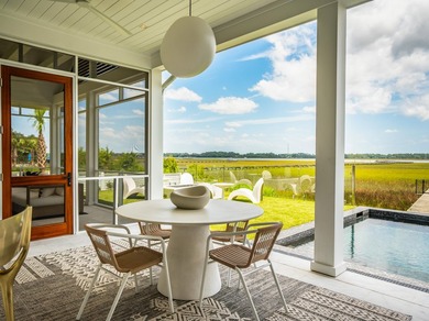 Modern coastal luxury awaits at 4017 Kaolin Street, a - photo 26
