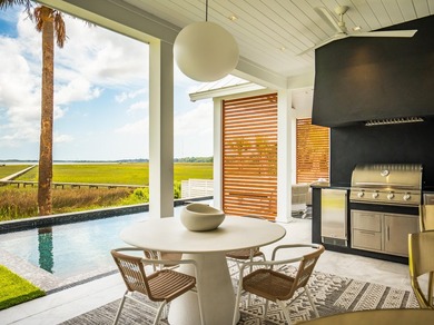 Modern coastal luxury awaits at 4017 Kaolin Street, a - photo 27