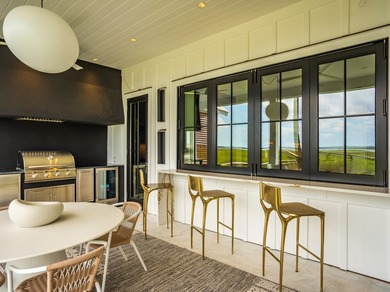 Modern coastal luxury awaits at 4017 Kaolin Street, a - photo 28