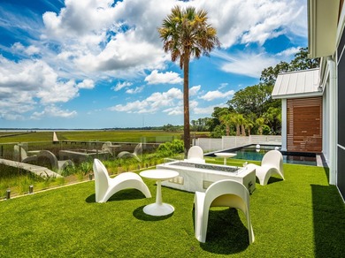 Modern coastal luxury awaits at 4017 Kaolin Street, a - photo 34