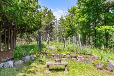 Welcome to this spacious 3 bedroom home in Charlevoix set on 4.2 - photo 46
