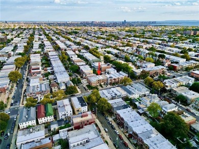 Welcome to Dyker Heights this exceptional extra wide brick - photo 4