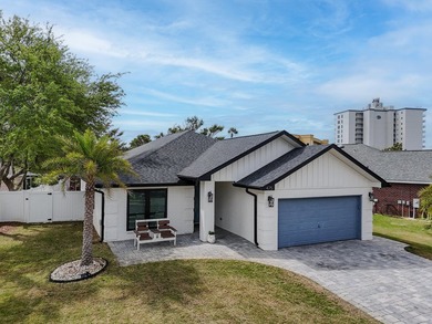 Welcome to 475 Sandy Cay Drive--an exceptional 4-bedroom, 2-bath - photo 2