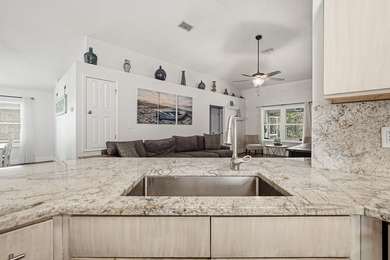Welcome to 475 Sandy Cay Drive--an exceptional 4-bedroom, 2-bath - photo 7