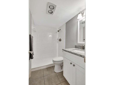 Beautifully remodeled ground floor unit in a gated 55 + - photo 12