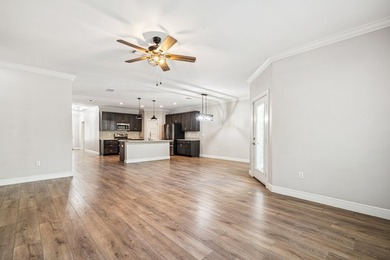 Welcome to this spacious, like-new 4-bedroom, 2-bath home lives - photo 2