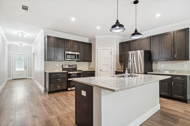 Welcome to this spacious, like-new 4-bedroom, 2-bath home lives - photo 3