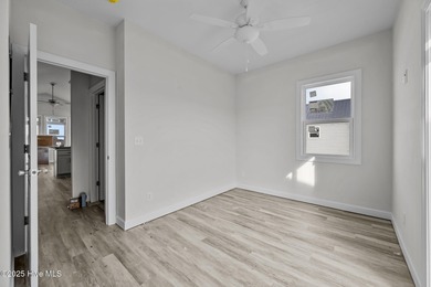 $10,000 USE AS YOU CHOOSE - MOVE-IN READY BEACH RETREAT! For