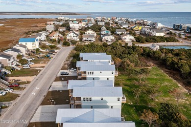 $10,000 USE AS YOU CHOOSE - MOVE-IN READY BEACH RETREAT! For