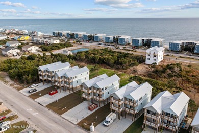 $10,000 USE AS YOU CHOOSE - MOVE-IN READY BEACH RETREAT! For