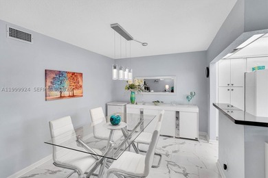 PRISTINE CONDITION and TOTALLY REMODELED unit in this IDEAL - photo 5