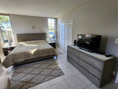 This Lakefront, spacious, Ground Floor 3 Bedroom, 2 Bath Condo - photo 12