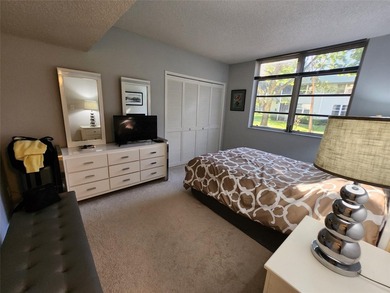 This Lakefront, spacious, Ground Floor 3 Bedroom, 2 Bath Condo - photo 22