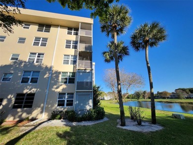 This Lakefront, spacious, Ground Floor 3 Bedroom, 2 Bath Condo - photo 31