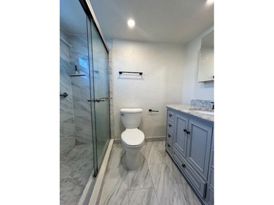 Welcome to easy living in this renovated 1 bedroom, 1.5 bath - photo 7