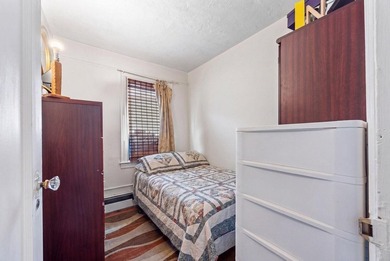 Nestled on the border of Flatlands and Mill Basin, this semi - photo 4
