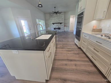 This beautifully designed one-level home offers 2,067 square