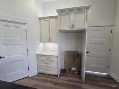 This beautifully designed one-level home offers 2,067 square