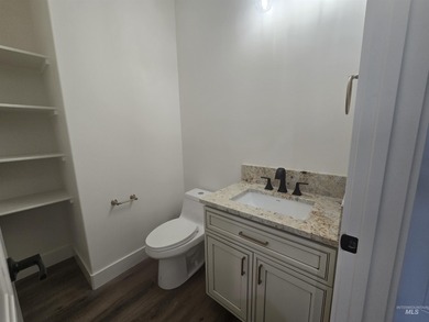 This beautifully designed one-level home offers 2,067 square