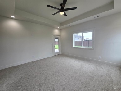 This beautifully designed one-level home offers 2,067 square