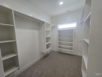 This beautifully designed one-level home offers 2,067 square