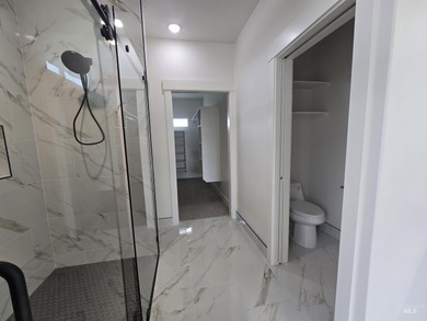 This beautifully designed one-level home offers 2,067 square