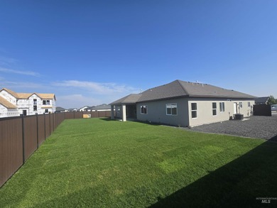 This beautifully designed one-level home offers 2,067 square