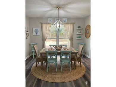 This comfortable cape/colonial home sits on a beautiful wooded - photo 12