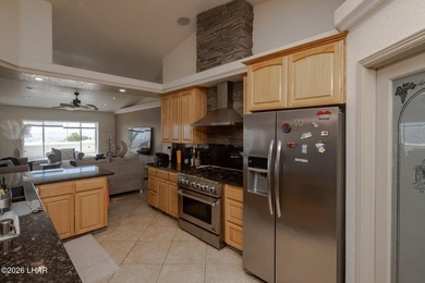 Check out the incredible lake views from the kitchen and dining - photo 16