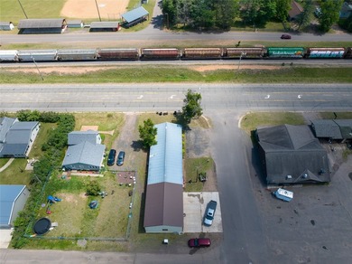 This versatile commercial property has a long-standing history - photo 10