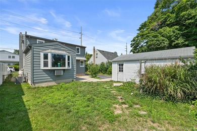 Welcome to This Beautifully Renovated 4-Bedroom, 2 Bath Expanded - photo 19