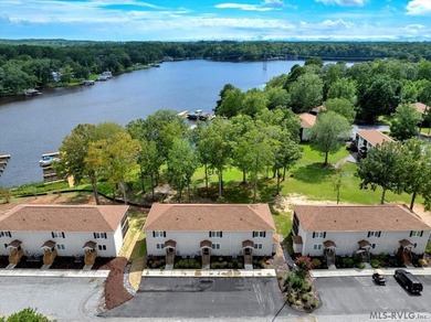 Experience the beauty of lakeside living in this exceptional - photo 11