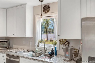 Experience the beauty of lakeside living in this exceptional - photo 27