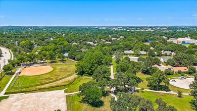 Motivated seller! With 5 oversized bedrooms, pool, top-tier - photo 37