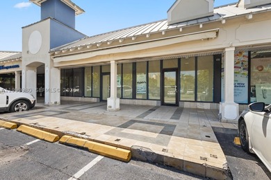 Located in a well-established, high-traffic strip center in the - photo 1